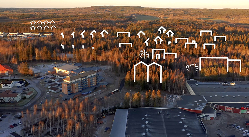 Flygbild över Norra Bråstorp med animerade skisser som visar att byggnation planeras på platsen. Foto.